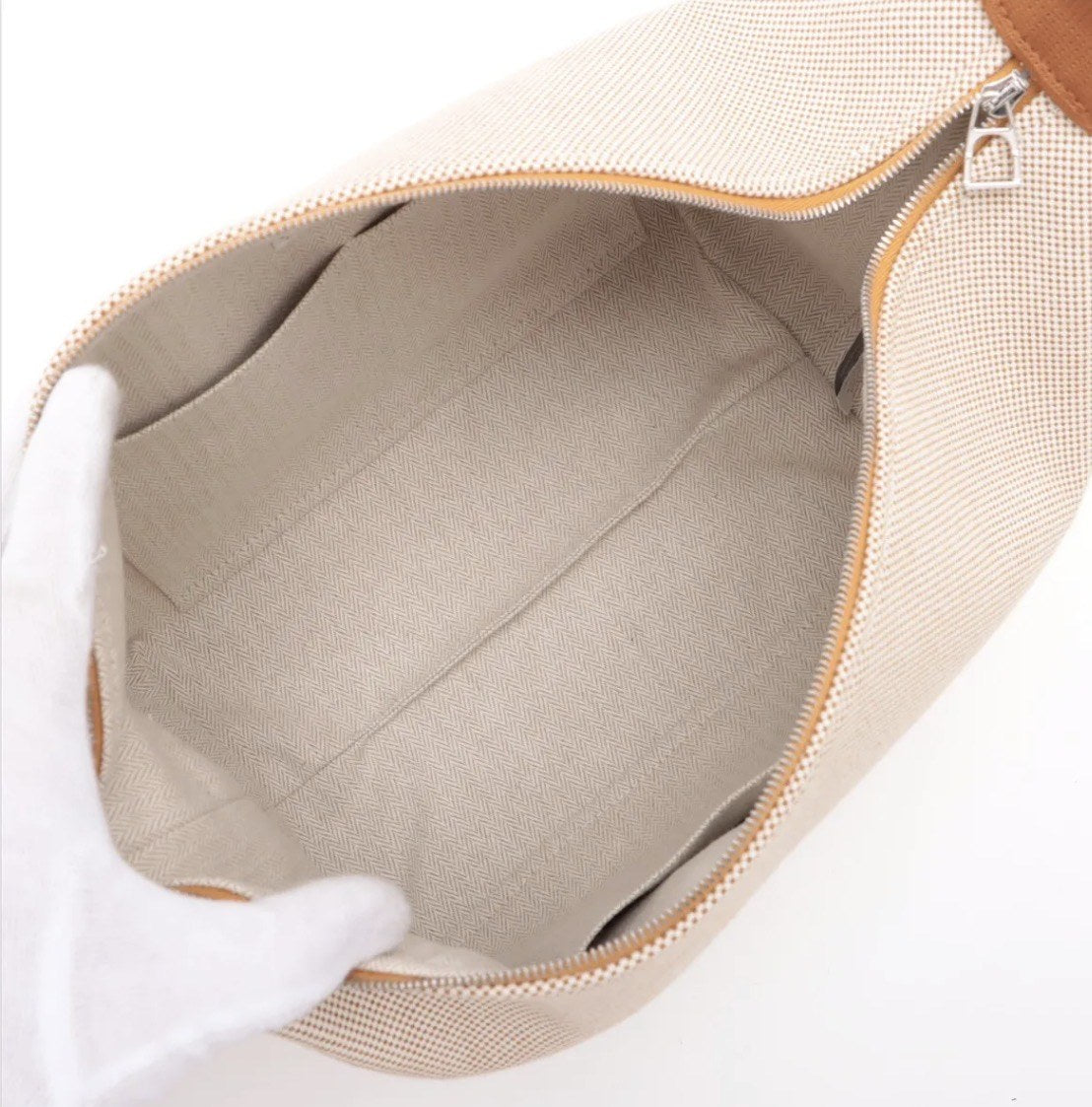 Interior showing the lined compartment and slip pockets