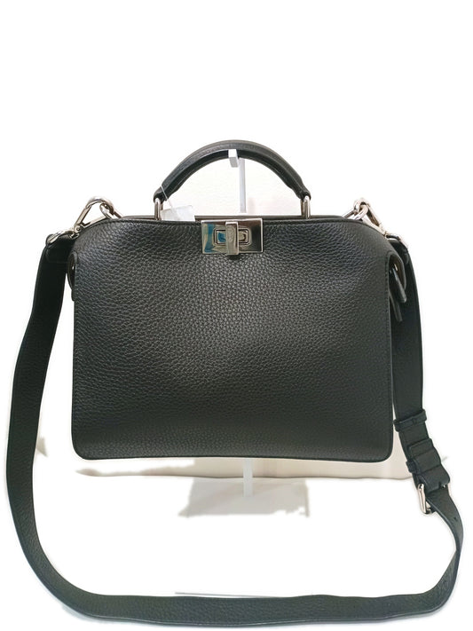 Fendi Peekaboo in black grained calfskin, front view with the engraved palladium twist lock and detachable strap