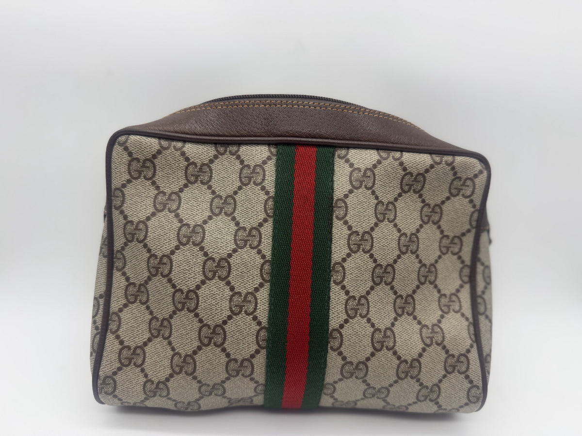 Vintage Gucci Accessory Collection cosmetic pouch in beige and brown GG Supreme canvas, front view with the green-red-green web stripe