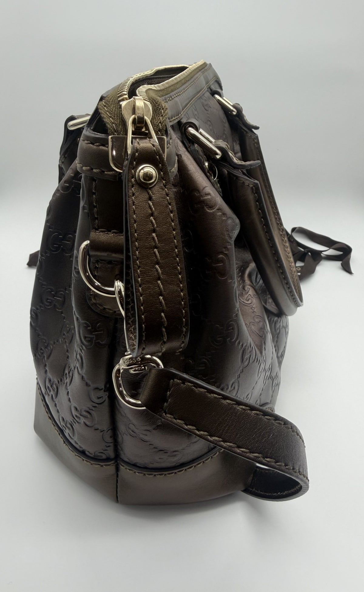 Side profile showing the gusset, D-rings and strap attachment