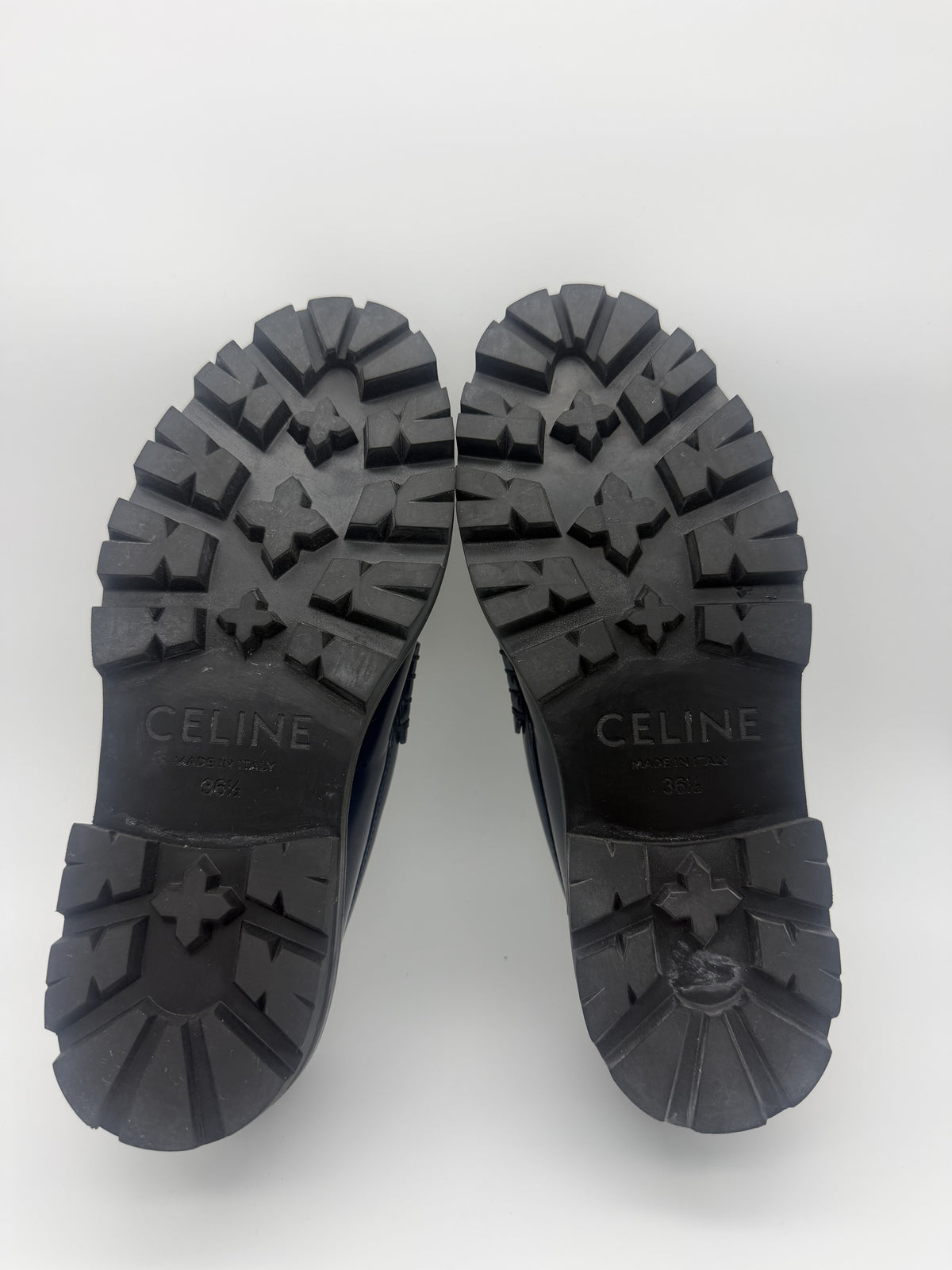 Outsoles showing the CELINE Made in Italy 36½ stamp and the abraded patch on the right heel block