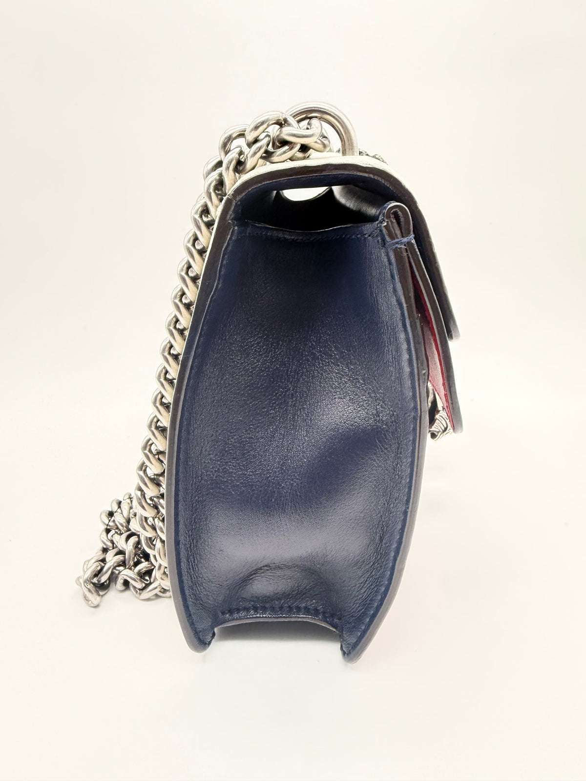 Opposite side profile showing the gusset and red flap edge