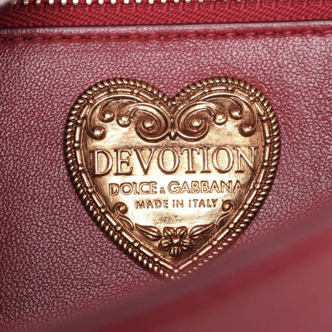 Macro of the DEVOTION Dolce & Gabbana Made in Italy heart plaque